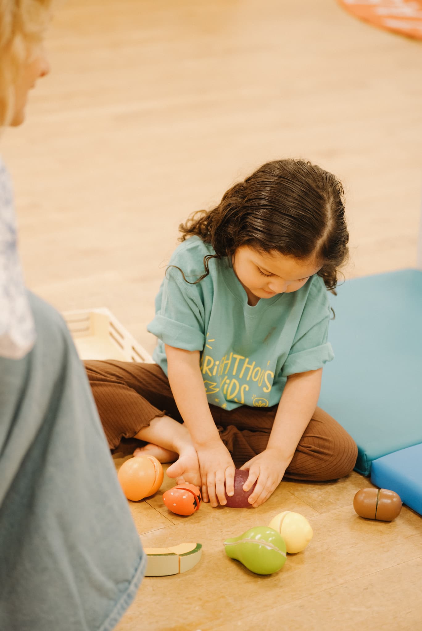 A child playing and learning in Brighthouse Kids