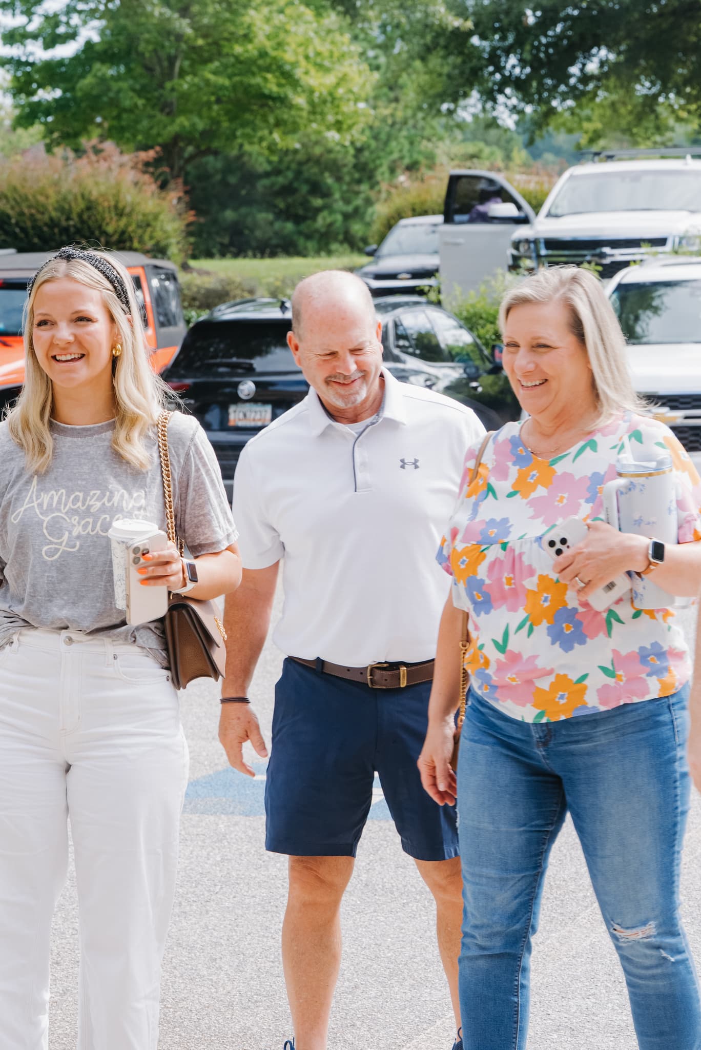 A family walking in together, connecting before a Sunday gathering
