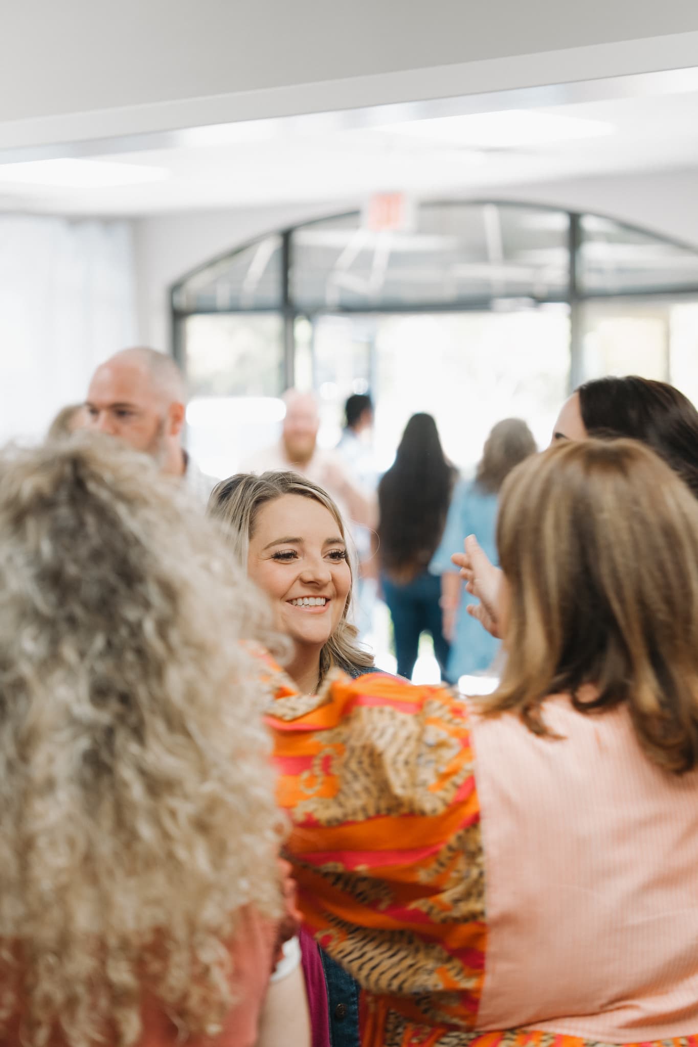 A guest being warmly greeted by the welcome team in the Brighthouse lobby